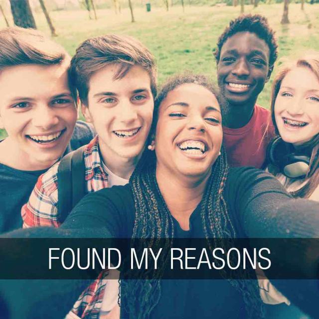 Group of teens gathered together to take a selfie with text stating 'found my reasons'