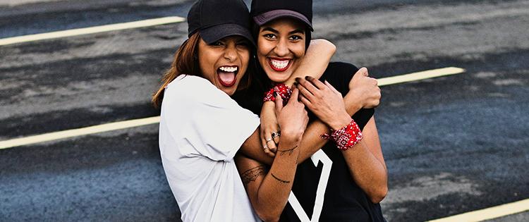 Two women embracing.
